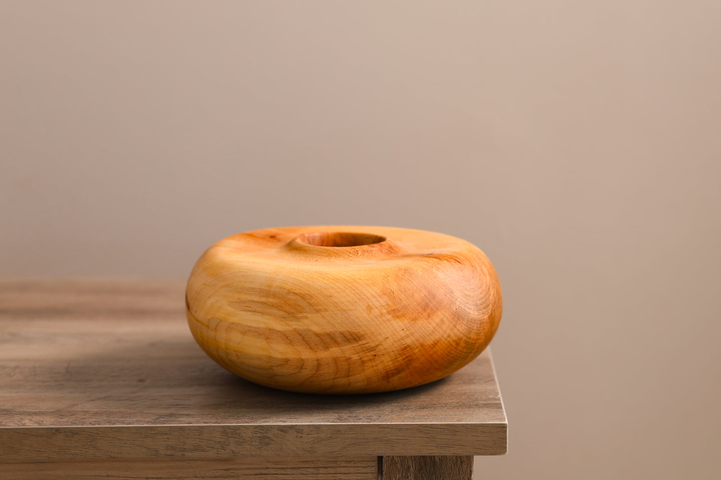 Wood turned maple hollow form.