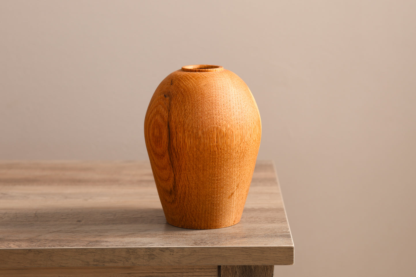Wood turned oak hollow form vase with some spalting.